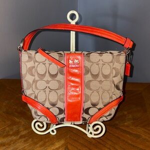 Coach Demi Shoulder Bag in Signature C Pattern and orange patent accents